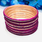 Gorgeous Purple Colored White Stoned Metal Bangles For Women