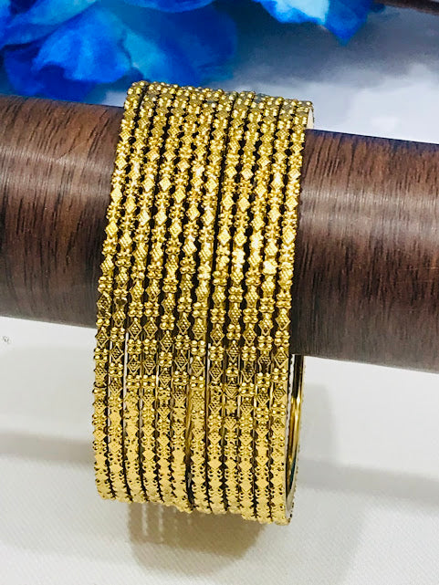 Pretty Gold Colored Traditional Wear Metal Bangles In Suncity