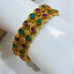Beautiful Matte Finished Antique Gold Bangle Set With Emerald And Ruby Stones