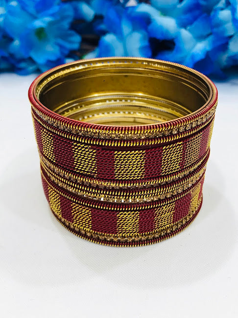 Dazzling Maroon Color Spiral Designed Bangles For Women