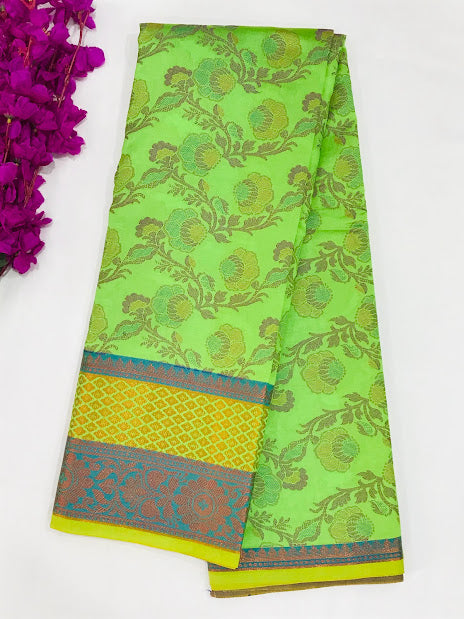 Fascinating Green Color Designer Cotton Saree With Flower Motifs And Contrast Brocade Pallu