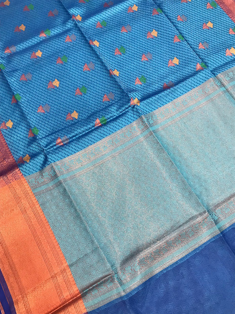 Magnificent Blue Color Designer Art Silk Saree With Flower Motifs And Zari Border With Fancy Tassels