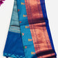 Magnificent Blue Color Designer Art Silk Saree With Flower Motifs And Zari Border With Fancy Tassels