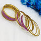 Exquisite Purple Color Party Wear Stone Designed Metal Bangles For Women