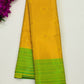 Appealing Yellow Color Brocade Art Silk Saree With Green Contrast Borde