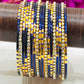 Enchanting Blue Color Stone Designed Metal Bangles For Women