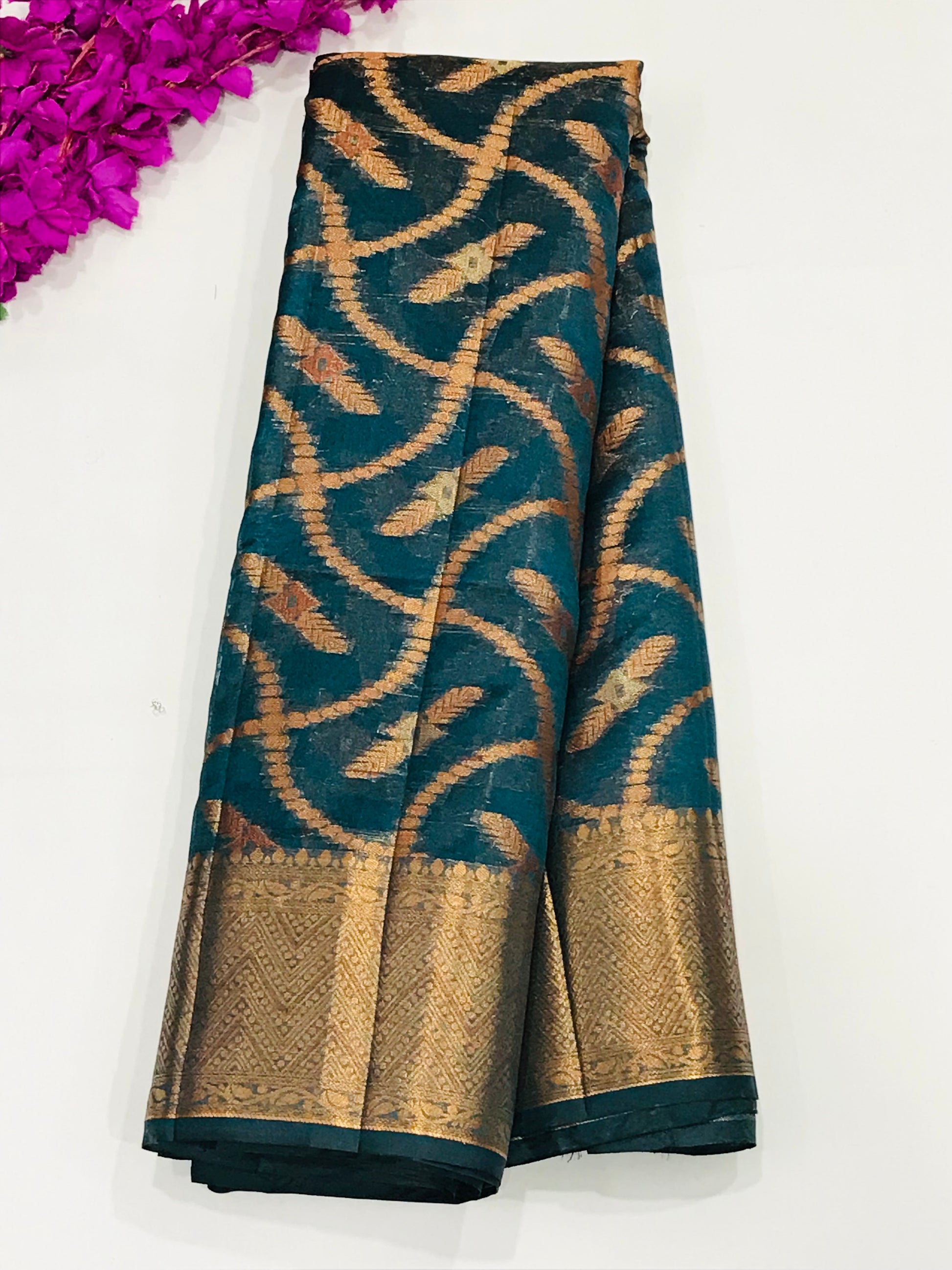 Stunning Teal Green Colored Raw Silk Saree With Zari Work