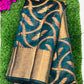 Stunning Teal Green Colored Raw Silk Saree In Yuma