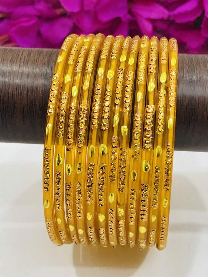 Alluring Yellow Color Party Wear Glass bangles For Women