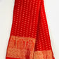 Gorgeous Red Color Designer Georgette Saree With Leaf Designs And Fancy Tassels