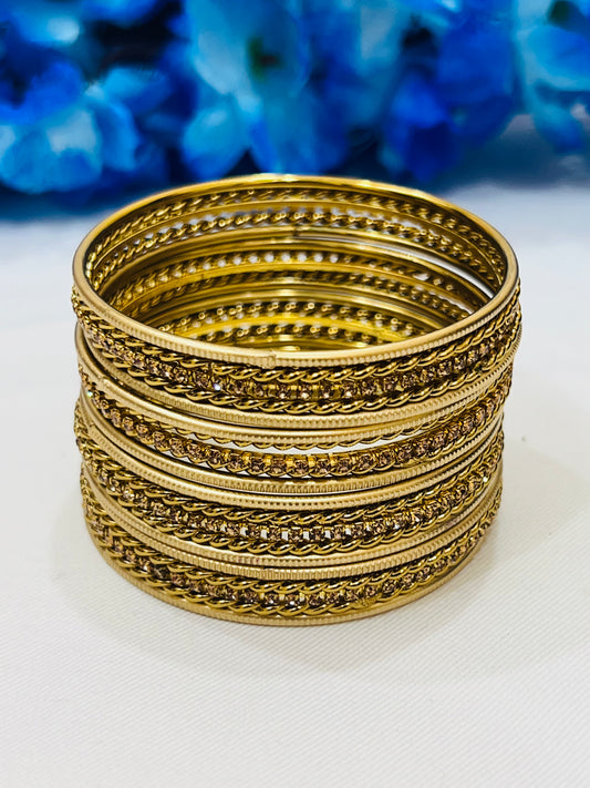 Pretty Gold Color Metal Bangles With Golden Design For Women