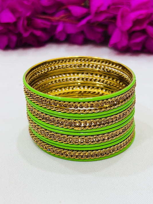 Alluring Light Green Color Metal Bangles With Golden Spiral Design Work