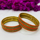 Appealing Orange Color Metal Bangles With Stone Work In Chandler