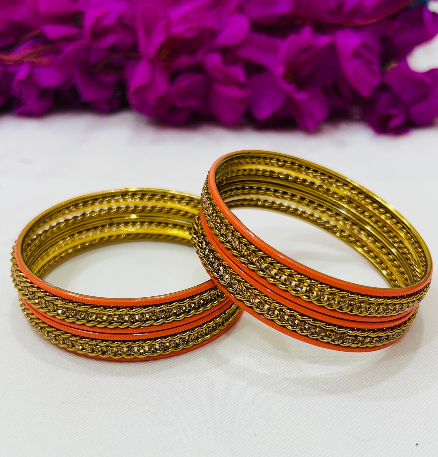 Appealing Orange Color Metal Bangles With Stone Work In Chandler