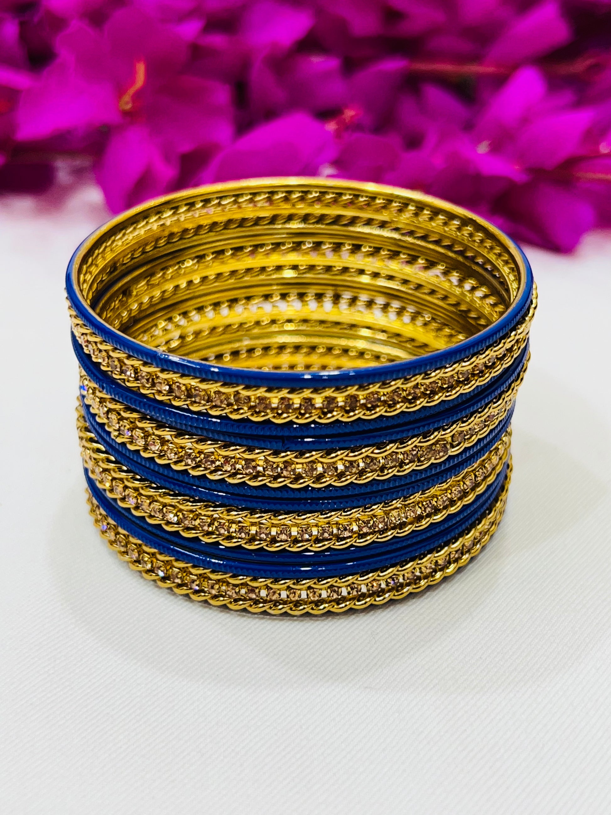 Enchanting Blue Color Smooth Finishing Metal Bangles For Women