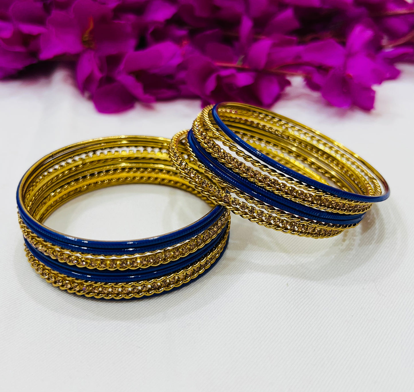 Enchanting Blue Color Smooth Finishing Metal Bangles For Women