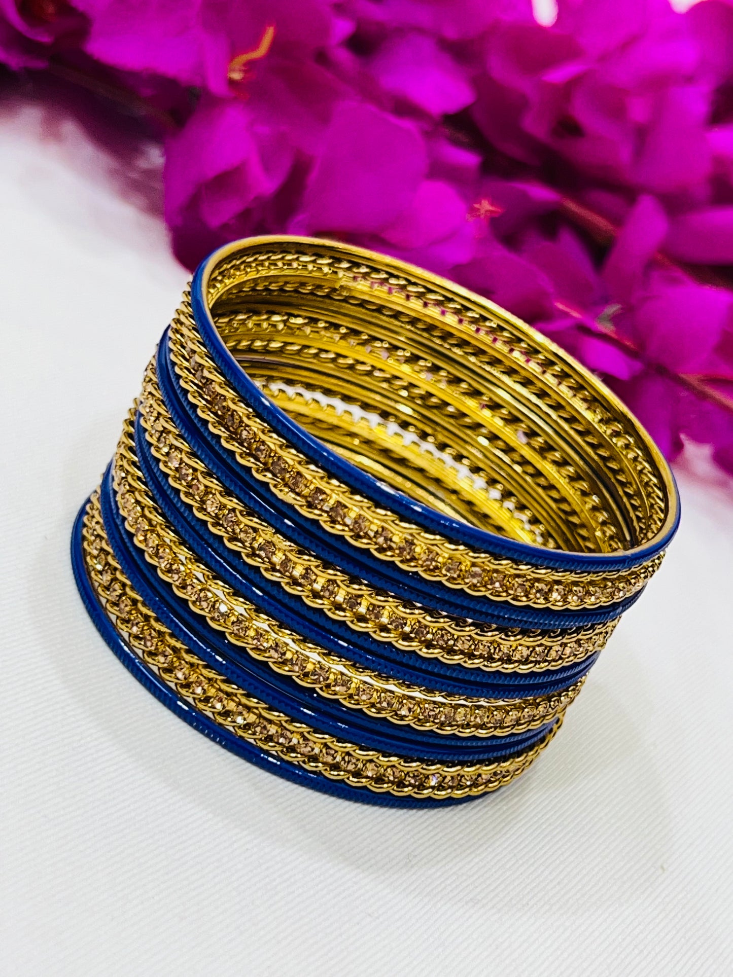 Enchanting Blue Color Smooth Finishing Metal Bangles For Women