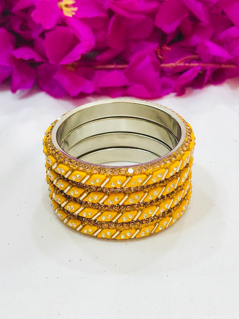 Dazzling Yellow Colored Metal Bangles For Girls