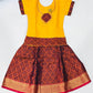 Attractive Yellow Colored Stone And Printed Work Silk Langa Sets For Girls