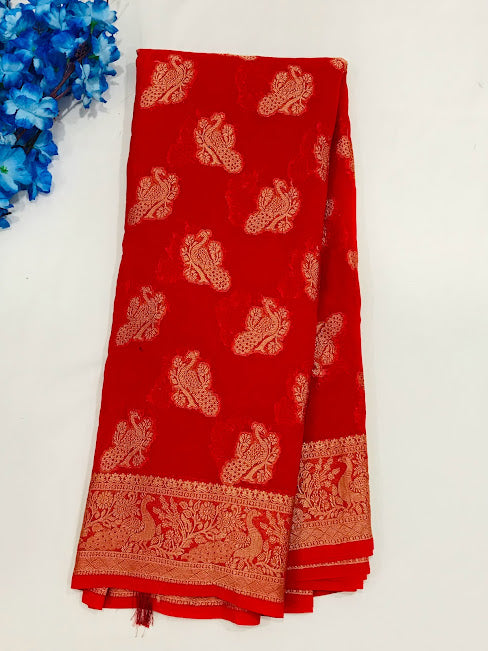 Fabulous Red Color Georgette Designer Saree With Peacock Motifs And Rich Pallu