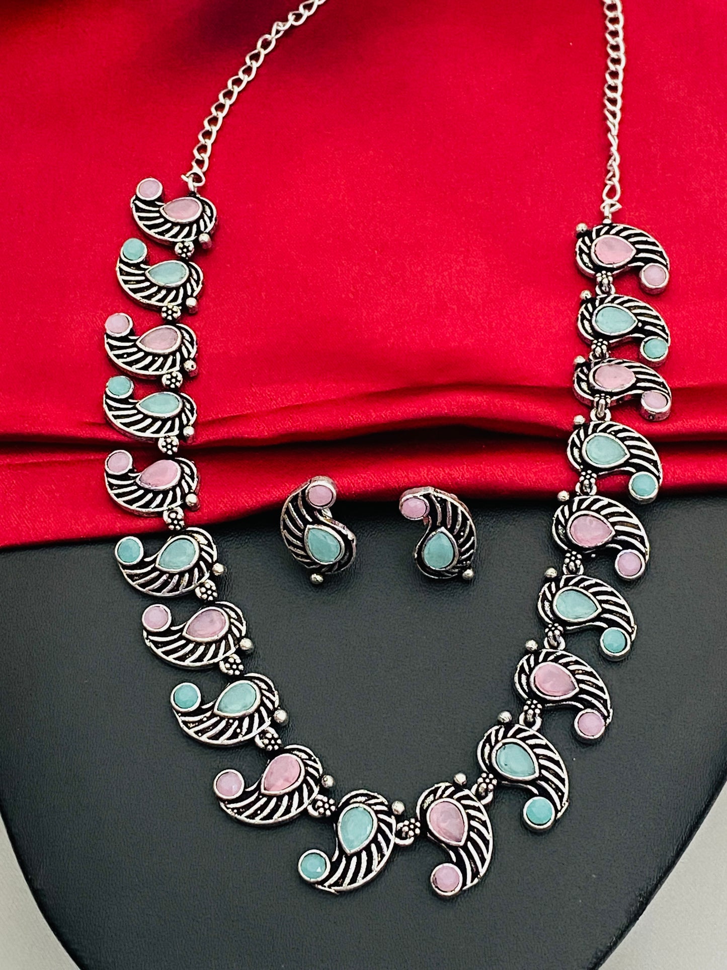 Pleasing Multicolor Stone Beaded Mango Design Silver Toned Oxidized Necklace With Earrings