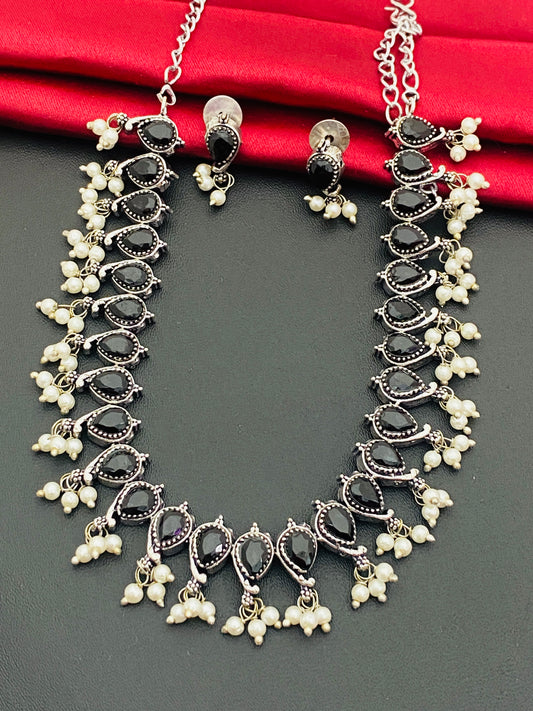 Lovely Black Color German Silver Plated Oxidized Short Neckpiece With Matching Earrings And Pearl Drops