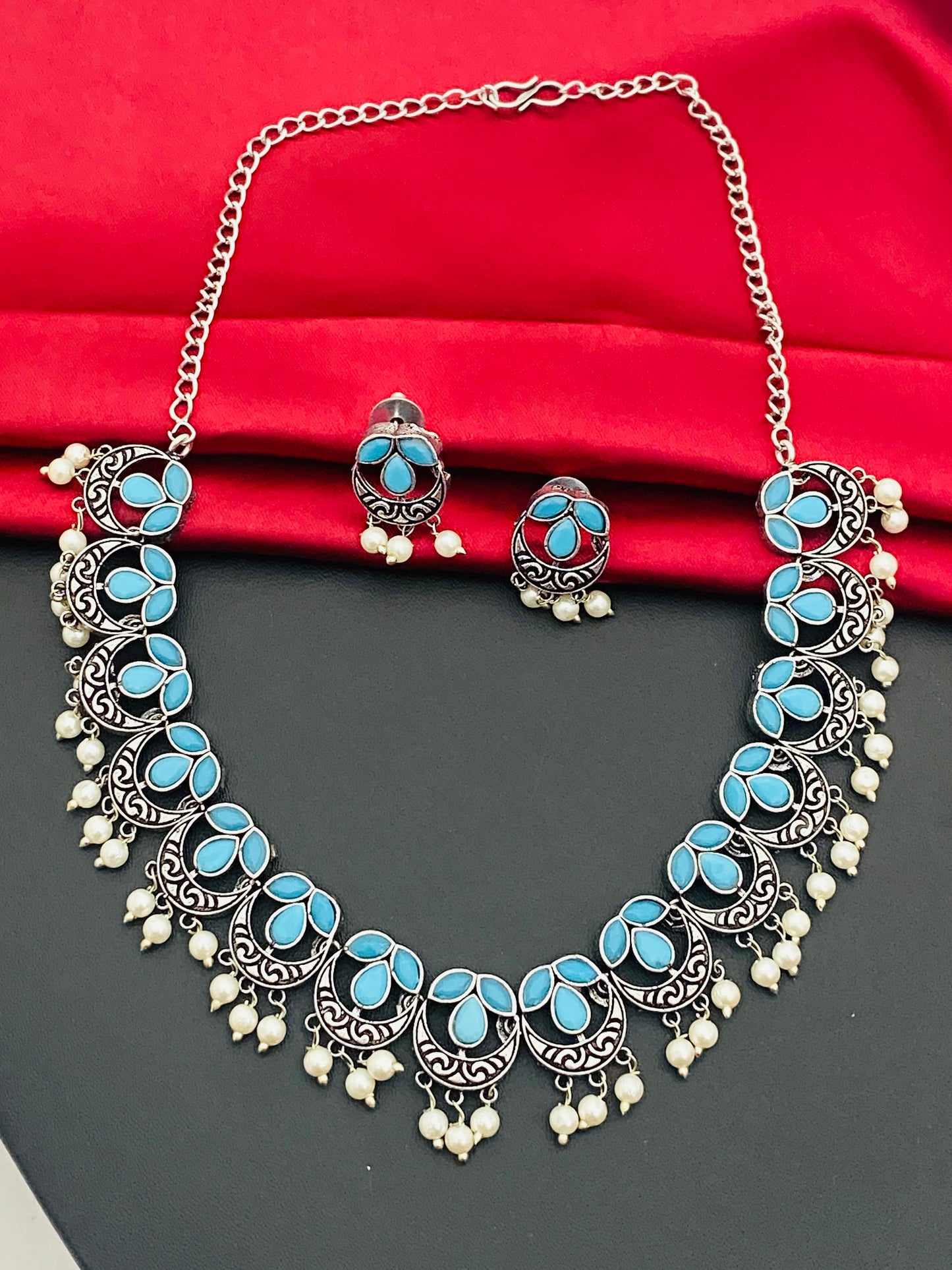 Pleasing Light Blue Color Stone Beaded Silver Plated Oxidized Pearl Necklace With Matching Earrings