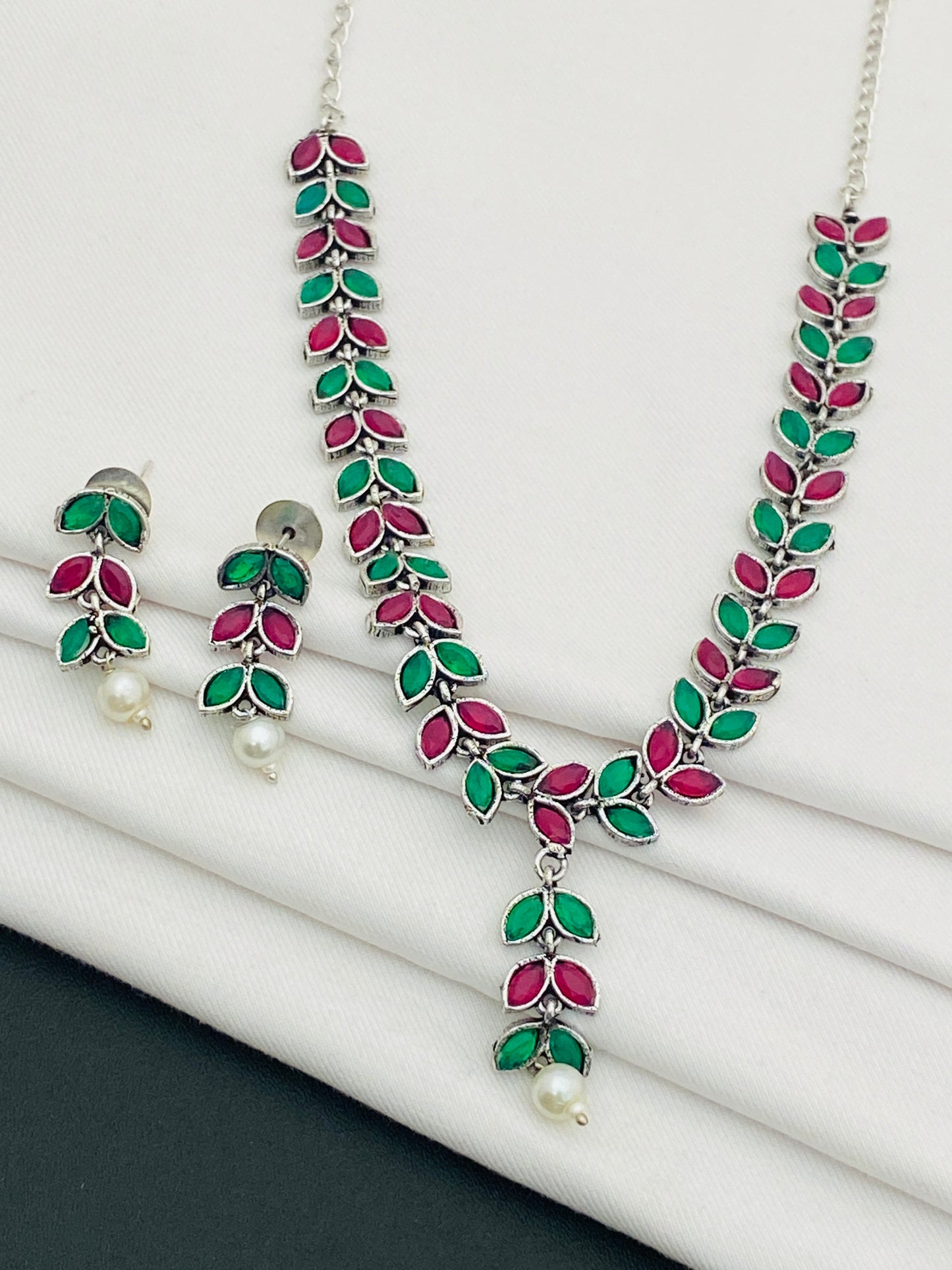 Ravishing Multi Color Stone Beaded Leaf Designed Silver Plated Oxidized Necklace With Earrings