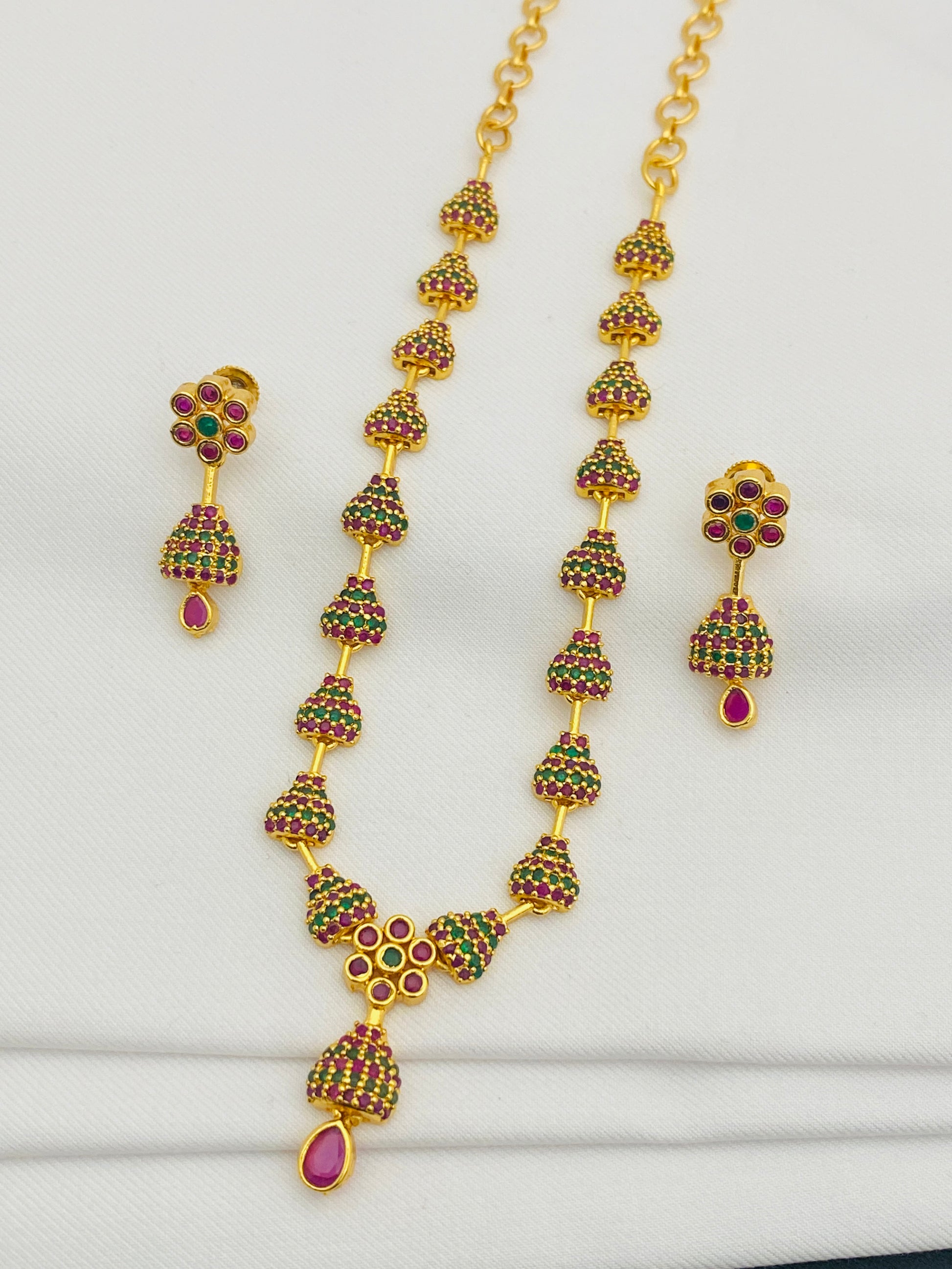 Beautiful Gold Plated Juhmka Designed Necklace And Earrings With Ruby And Emerald Stones