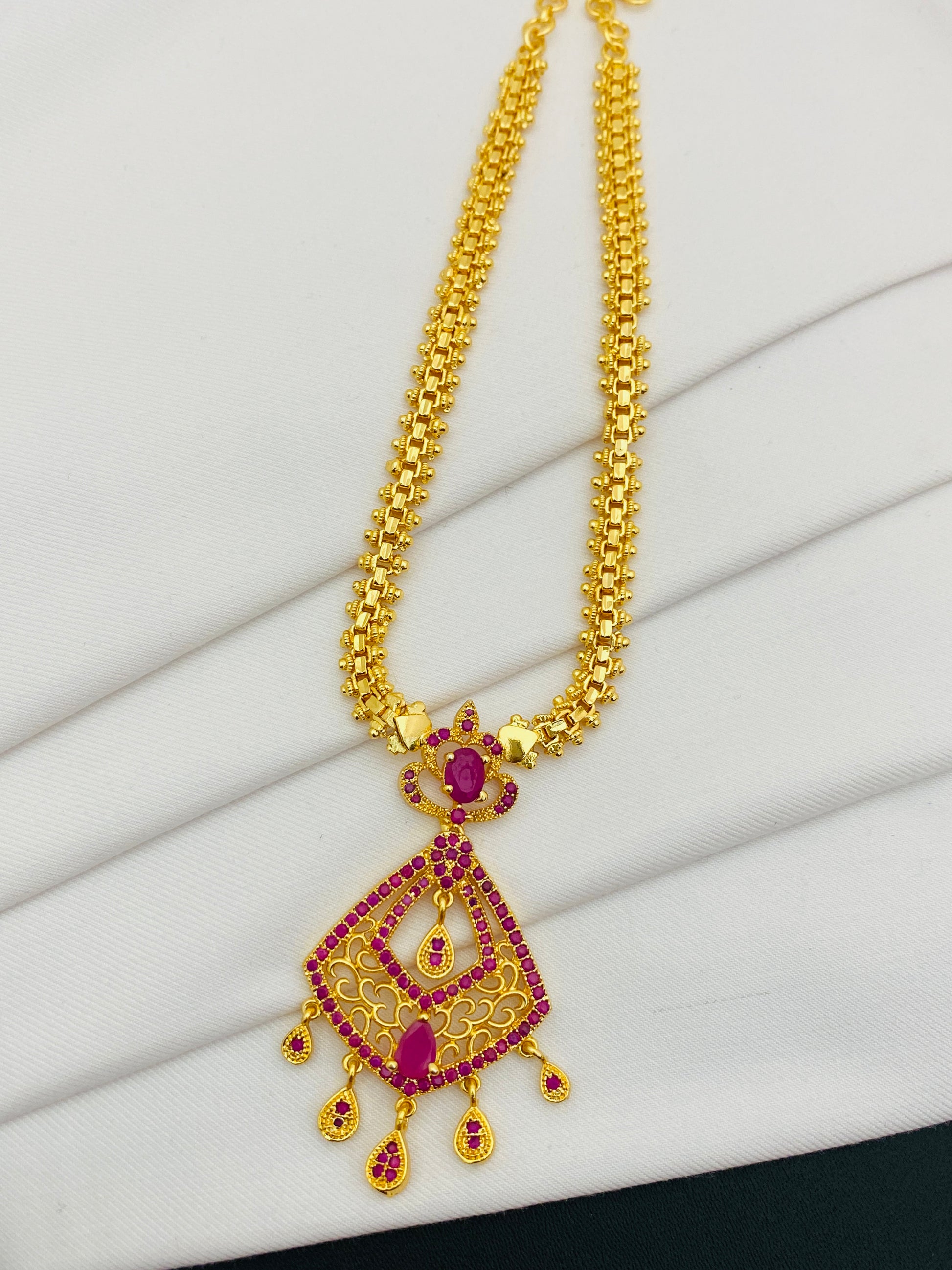 Gorgeous Traditional Party Wear Ruby Stoned Gold Plated Necklace
