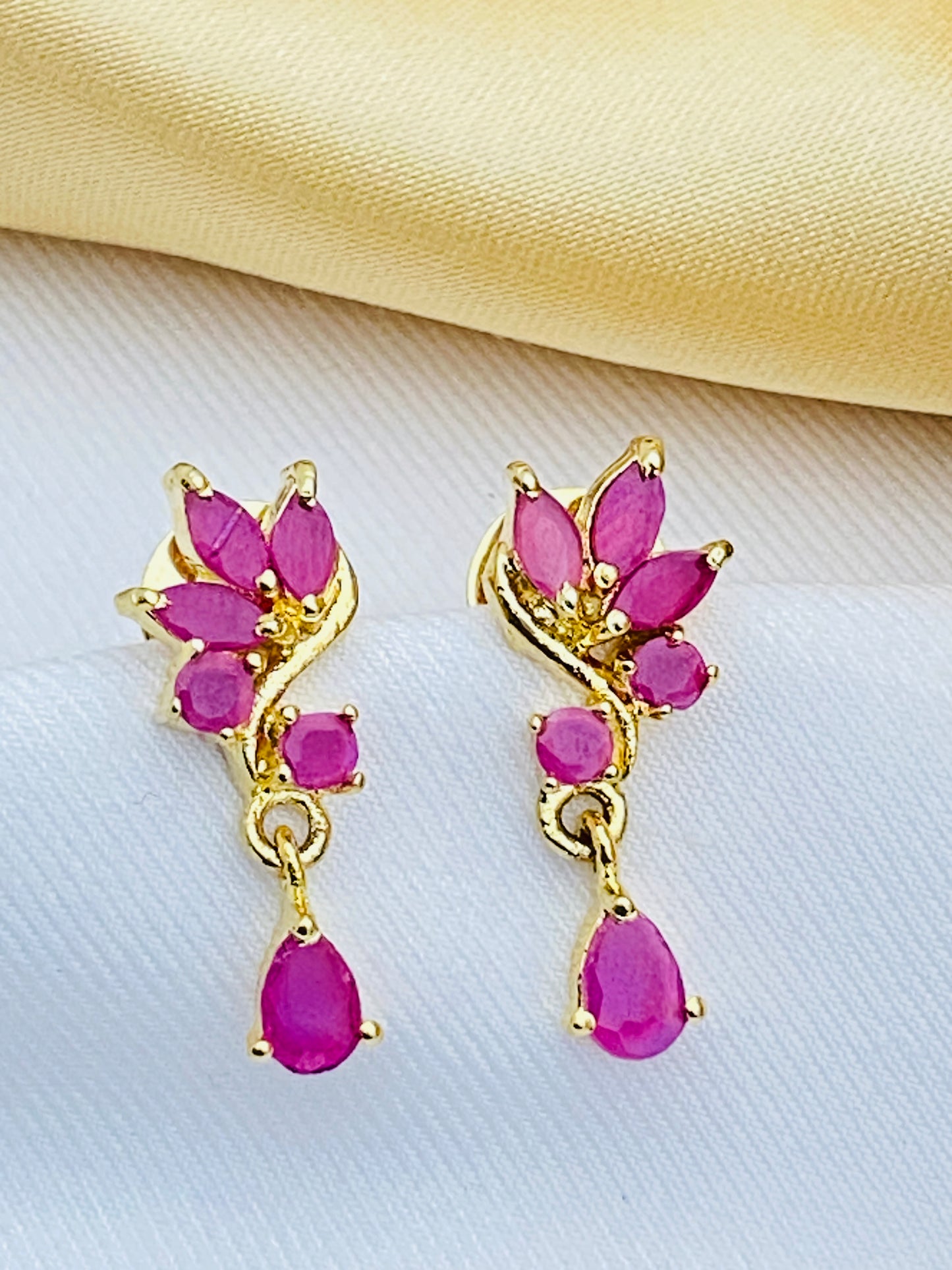 Elegant Ruby Stoned Gold Plated Earrings With Drops