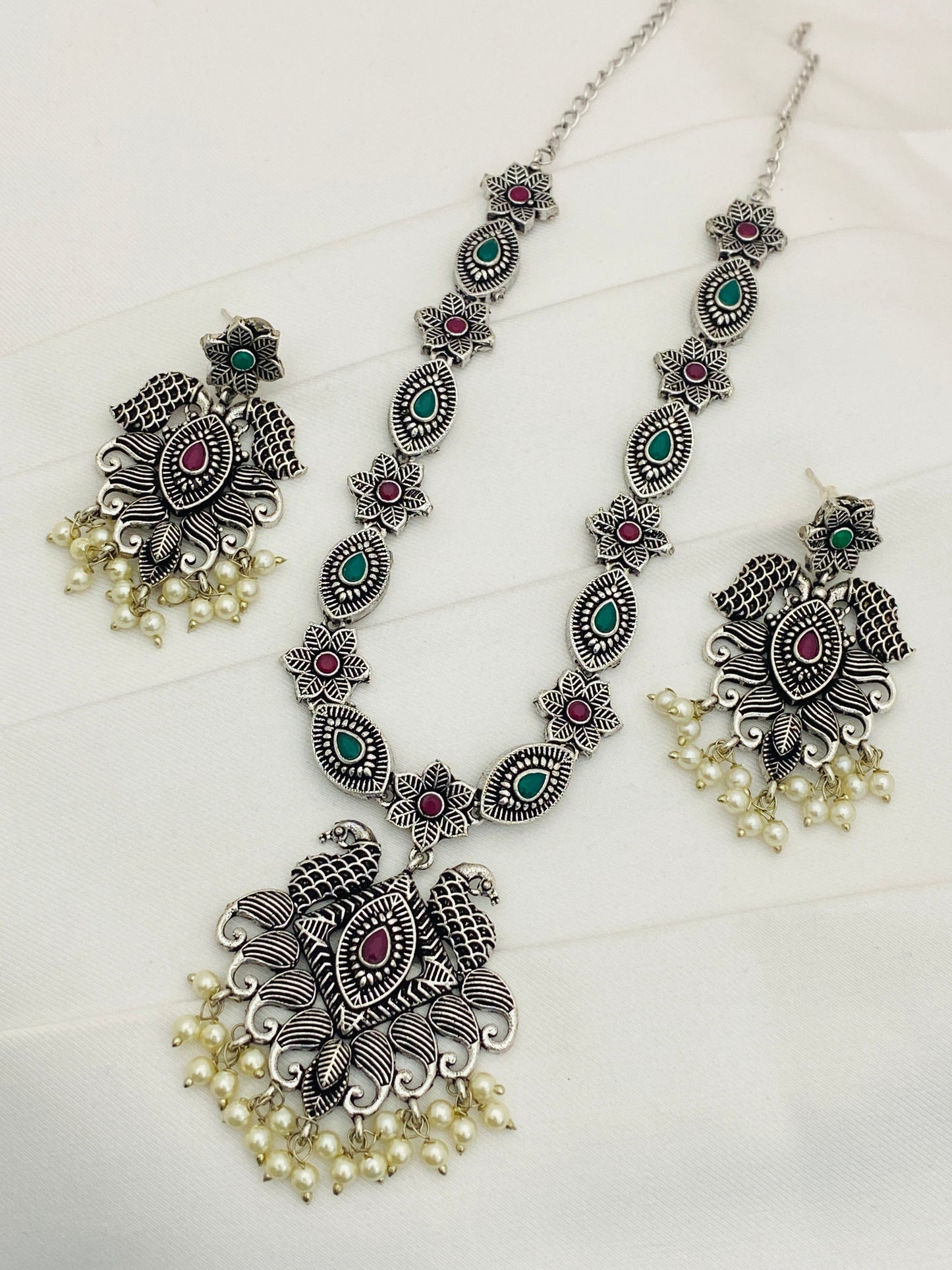 Multi Color Stone Studded Peacock Floral Designed Silver Toned Oxidized Necklace With Earrings in Yuma