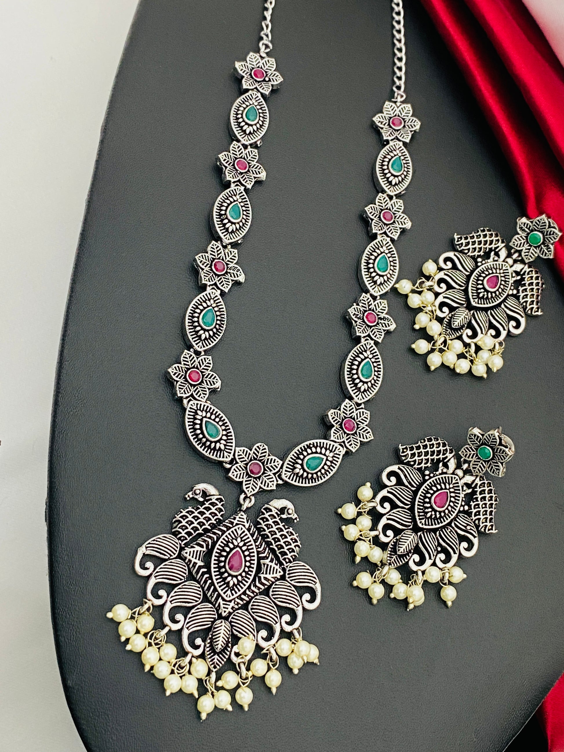 Dazzling Multi Color Stone Studded Peacock Floral Designed Silver Toned Oxidized Necklace With Earrings