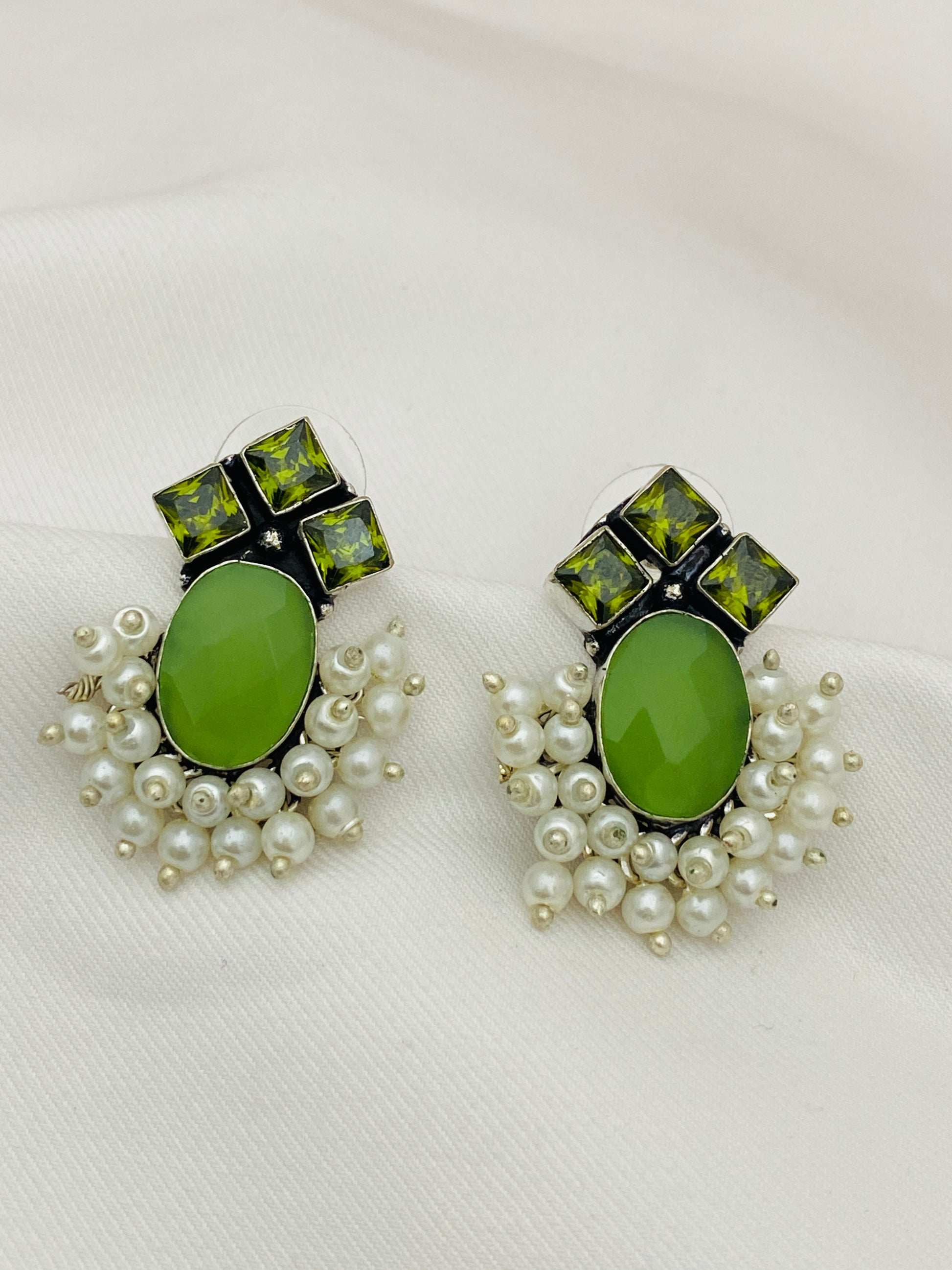 Elegant Oval Shaped Pista Green Color Silver Plated Stud Earrings With Pearl Beads