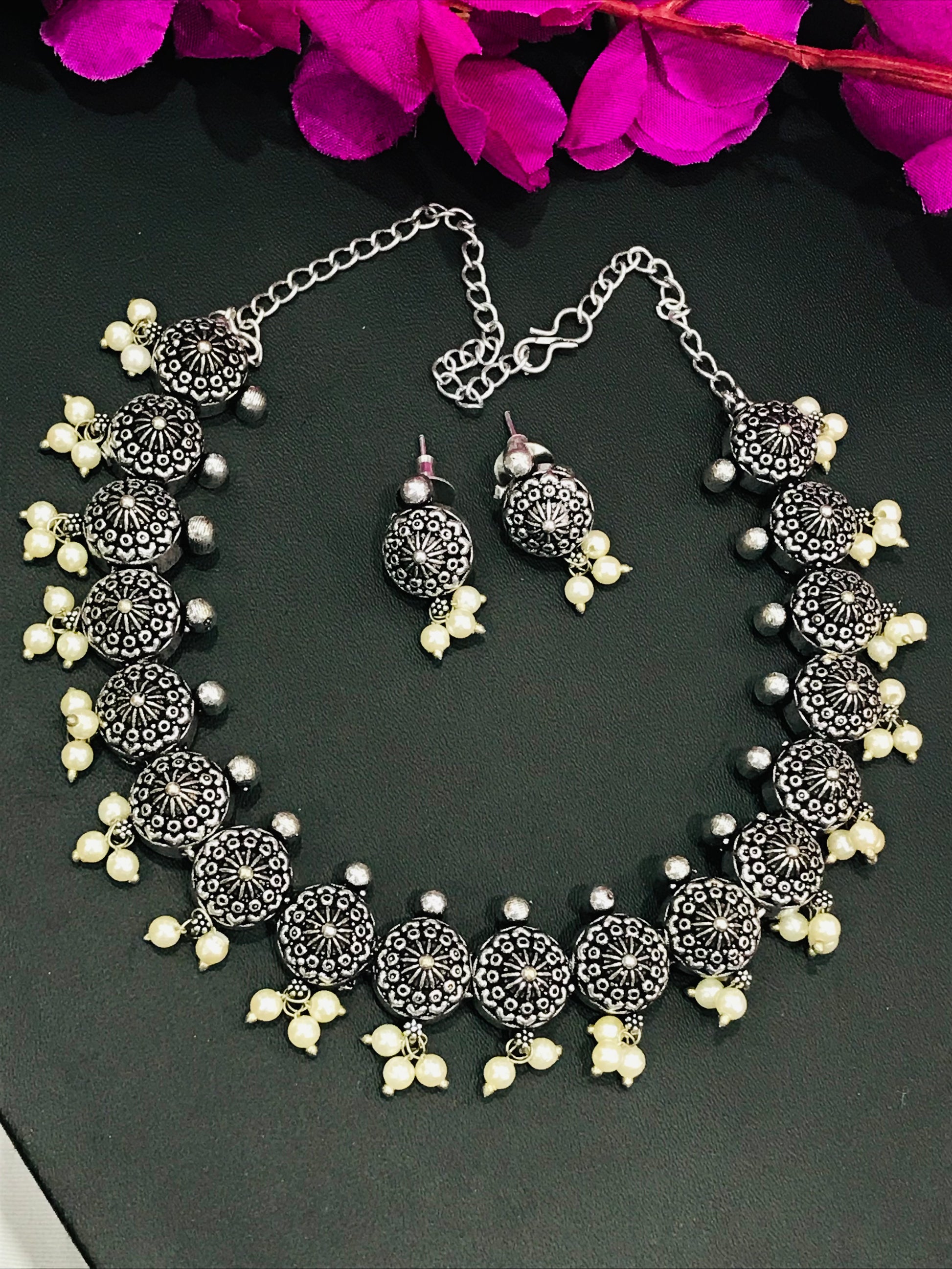 Alluring Floral Designed Silver Plated oxidized Necklace Set With Earrings And Pearl Beads