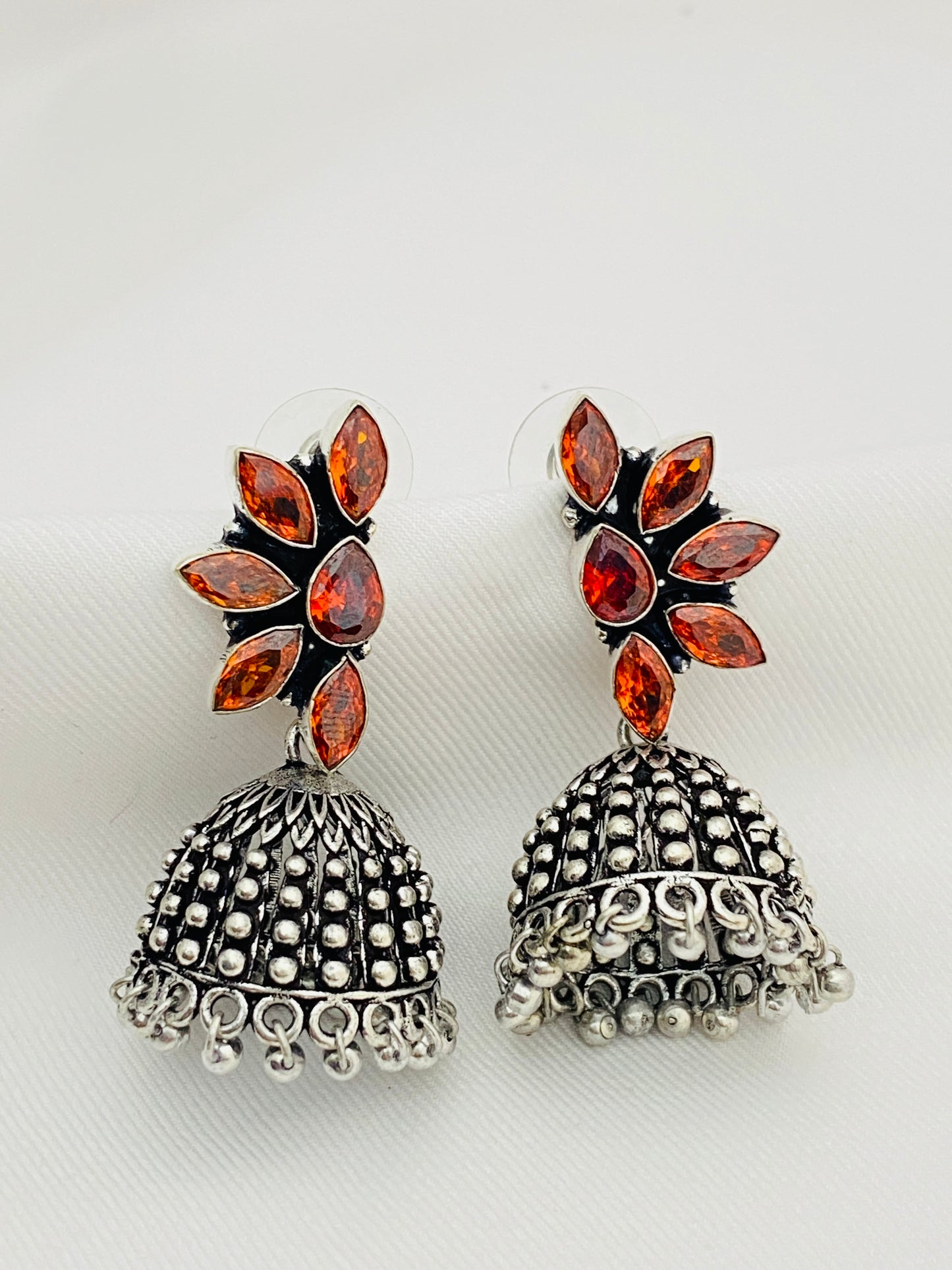 Classic Silver Plated Oxidized Designer Jhumka Earrings With Floral Design And Beads For Women
