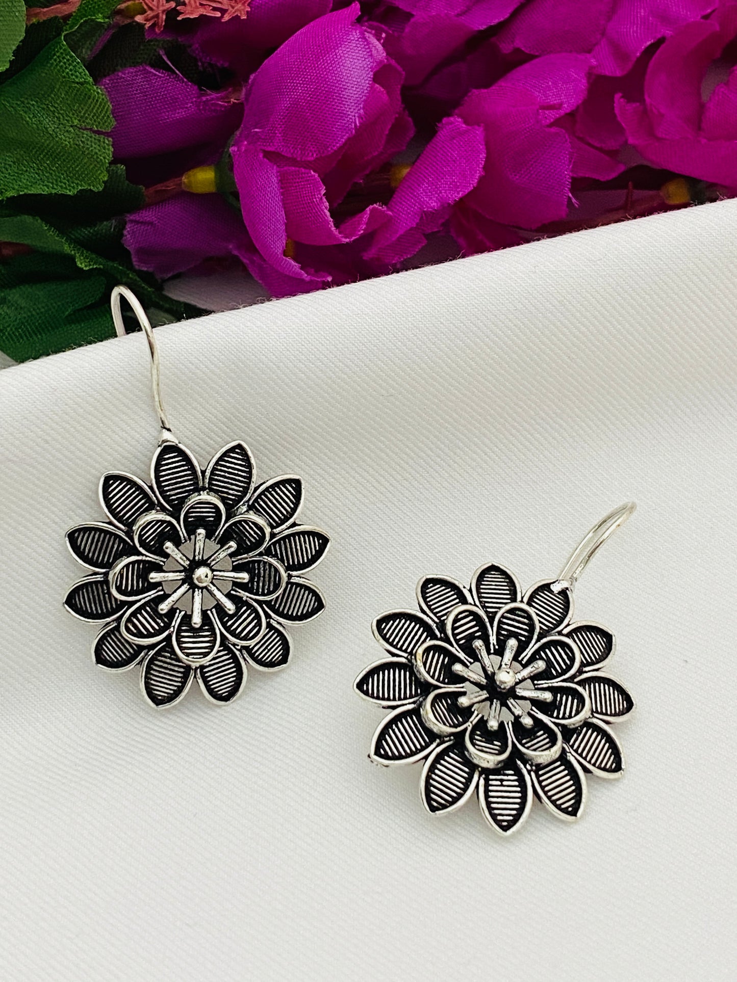 Dazzling Floral Designed German Silver Plated Earrings in Sahuarita