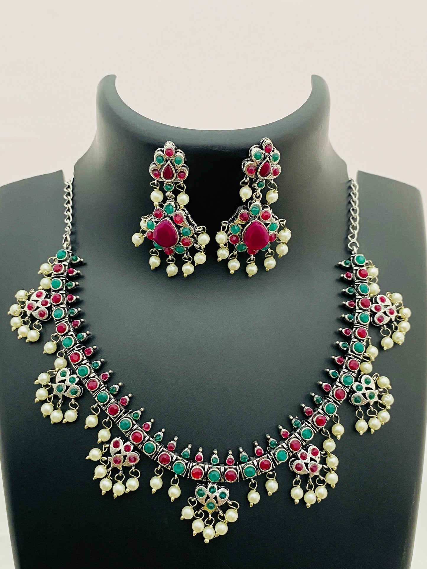 Gorgeous Multistone Beaded Flower Designed German Silver Plated Oxidized Necklace Set With Earrings And Pearl Beads