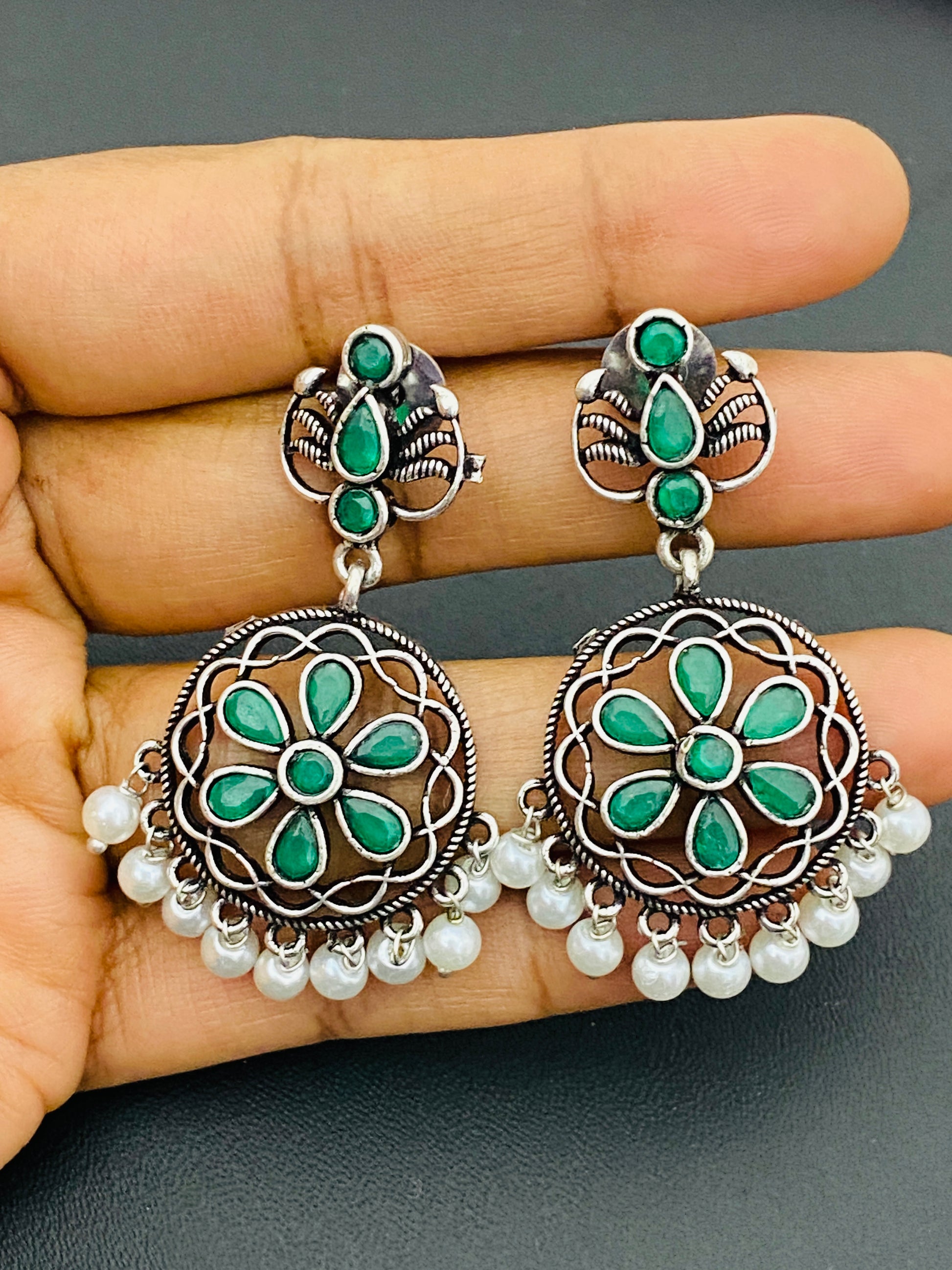 Emerald Stone Studded Flower Designed Silver Toned Oxidized Earrings Near Me
