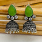 Lovely Green AD Stone Beaded Silver Toned Designer Jhumka Earrings With Black Pearl Drops