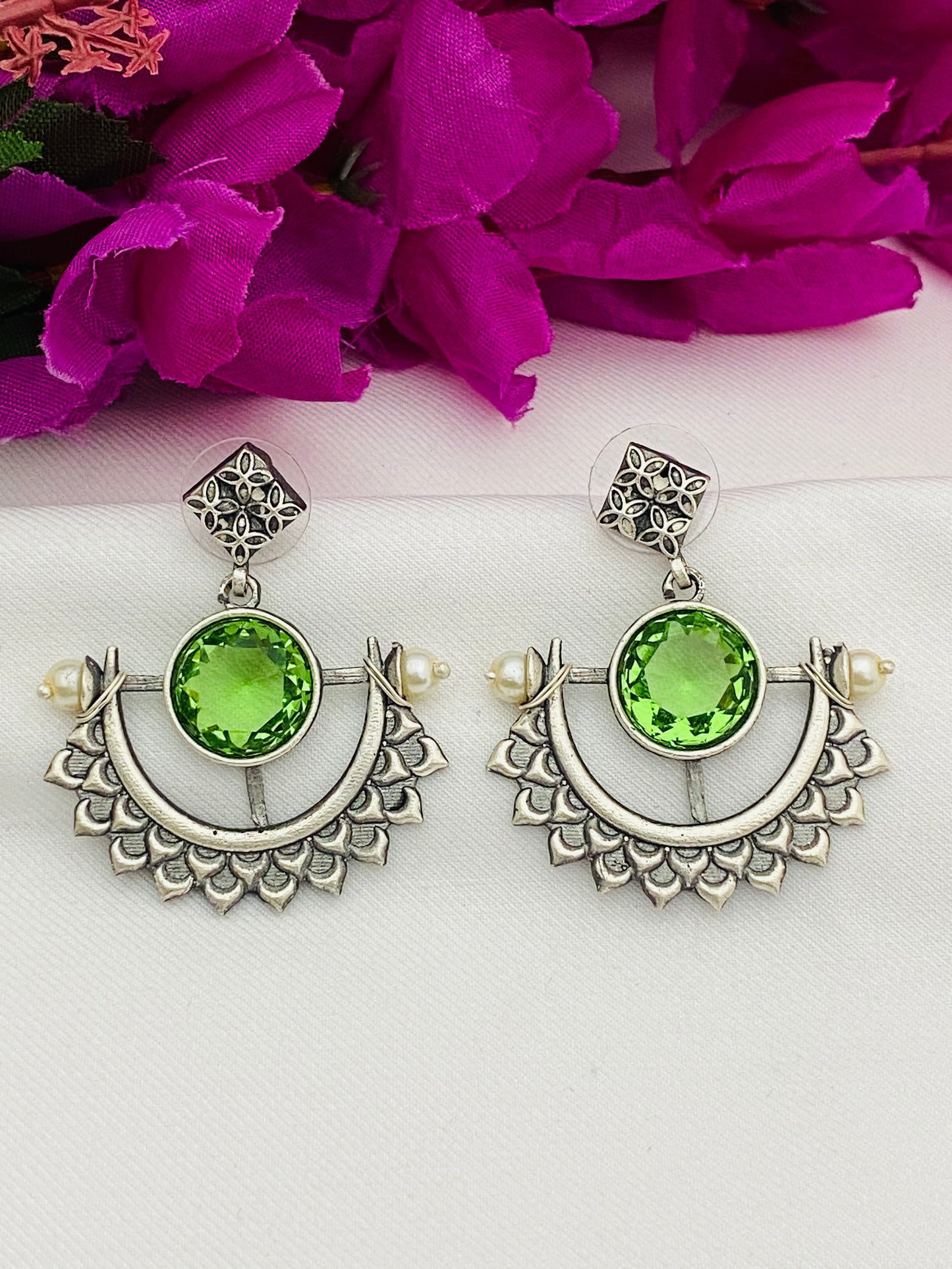 Charming Light Green Stone Studded Half Moon Designed Silver Plated Oxidized Earrings
