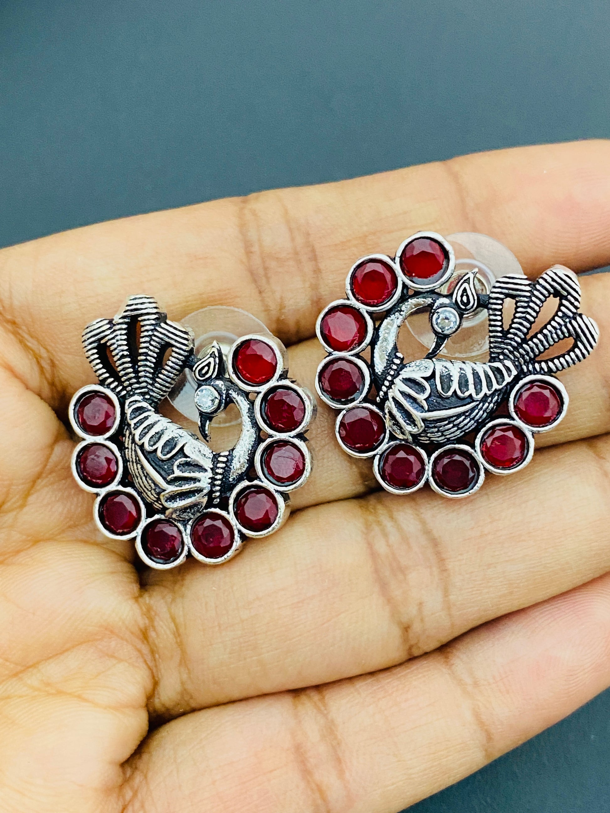  Red Stone Studded Peacock Designed Silver Toned Oxidized Stud Earrings Near Me
