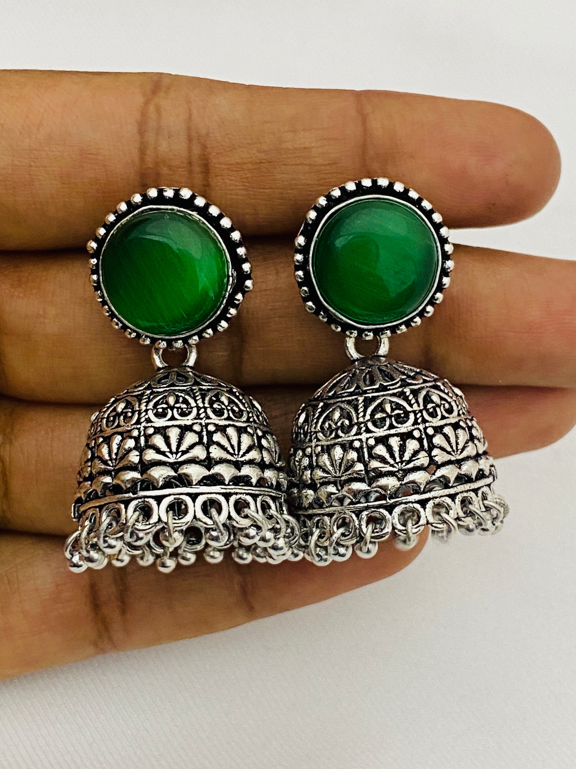 Emerald Stone Studded Silver Toned Oxidized Jhumka Earrings Near Me