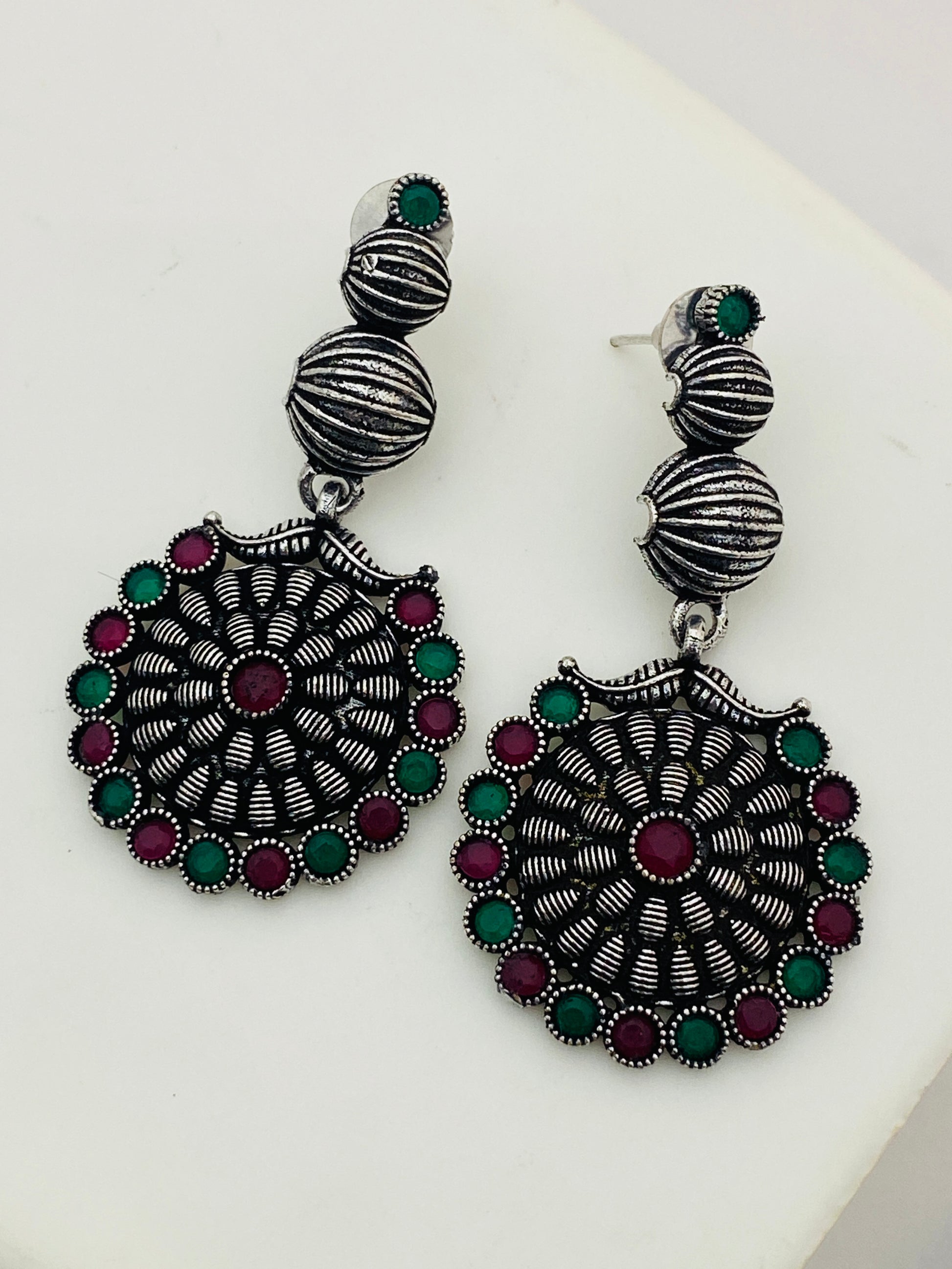 Fascinating Emerald And Ruby Stone Beaded Silver Toned Long Oxidized Earrings For Women