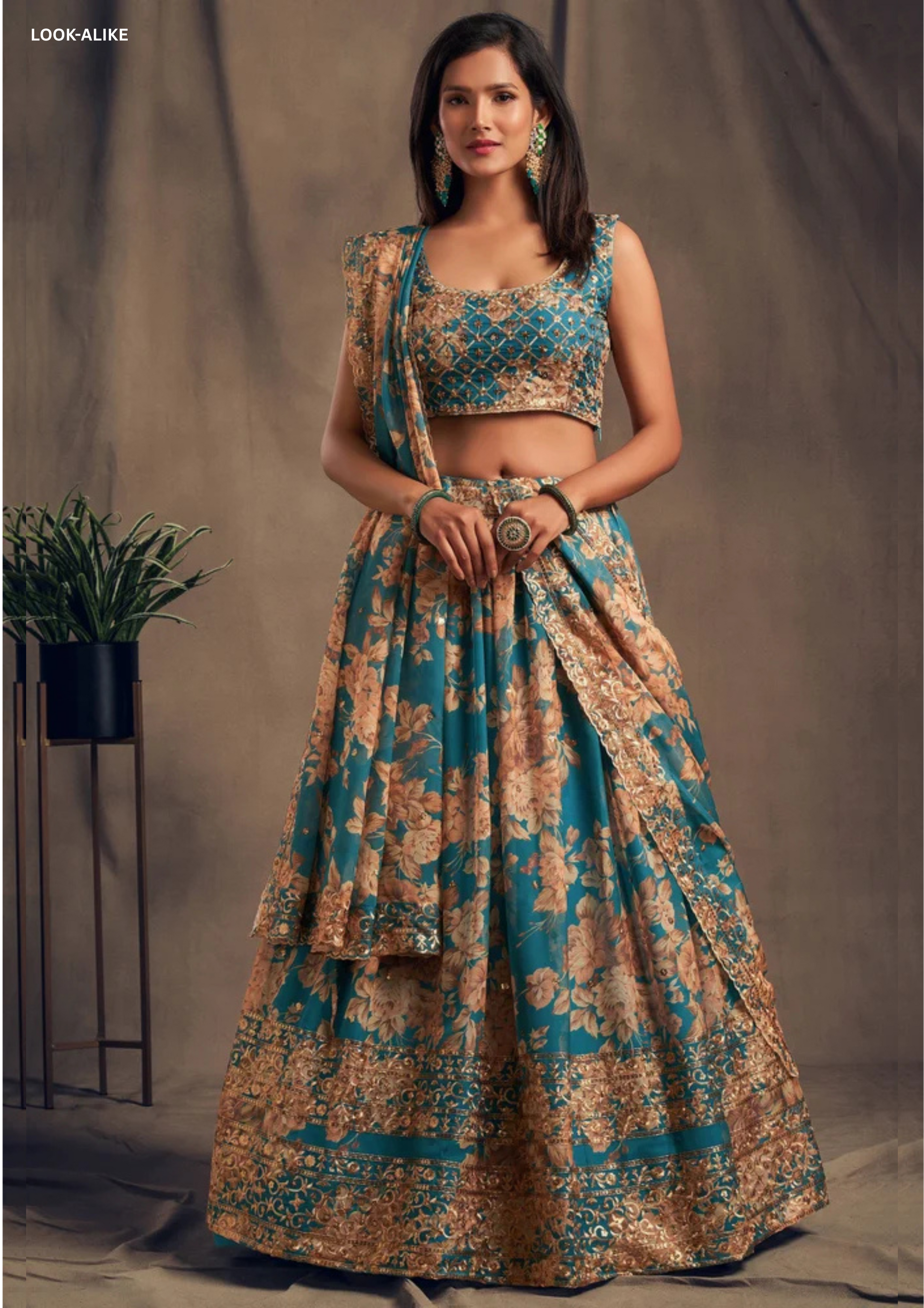 Beautiful Teal Blue Color Golden Zari And Sequins Embroidered Lehenga Choli With Dupatta