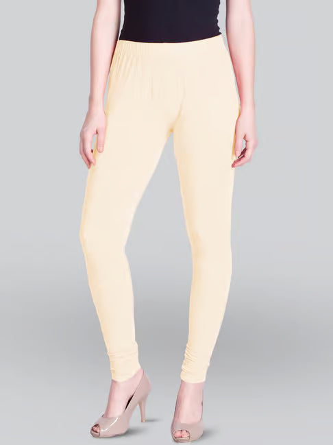 Charming Cream Color Stretchable Rayon Elastane Leggings For Women
