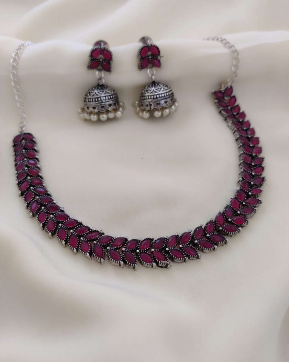 Beautiful Ruby Stone Beaded Leaf Designed Silver Oxidized Necklace Set With Jhumka Earrings