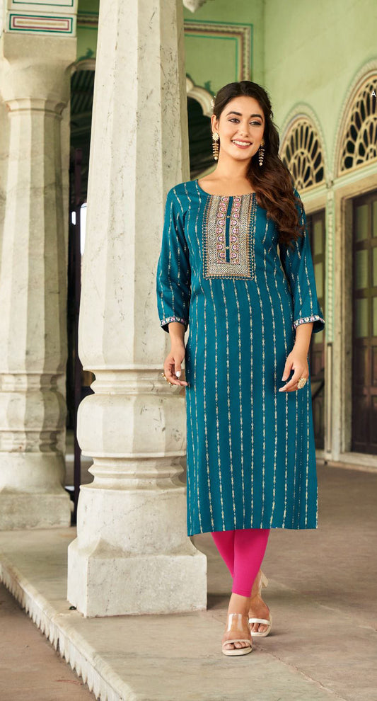 Attractive Teal Blue Color Classy Rayon Foil Print With Embroidery Work Kurti For Women