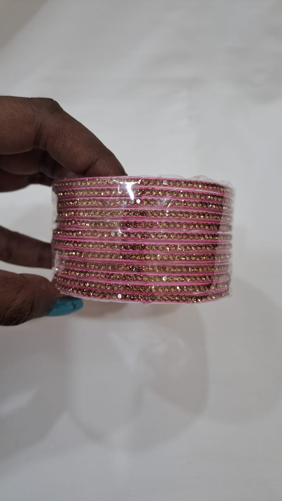 Alluring Dark Pink Color Glass Bangles With Glittering Stones For Women