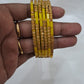 Appealing Yellow Color Stone Work Glass Bangles For women